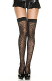 Black spiderweb-patterned thigh-high stockings worn by a model, paired with a black mini skirt and black patent platform heels, against a plain white background.